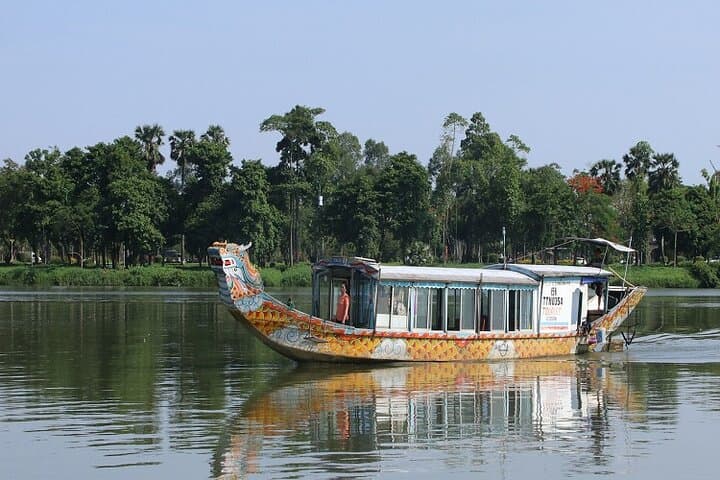 Dragon Boat, Thien Mu Pagoda & Tombs Tour by Car/Motorbike