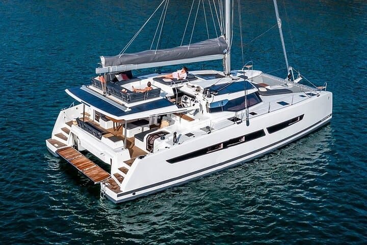 Mykonos: Brand-New Catamaran Cruise with Meal, Drinks & Transport